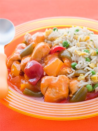 Sweet and Sour Chicken with Egg Fried Rice Stock Photo - Budget Royalty-Free & Subscription, Code: 400-04043234