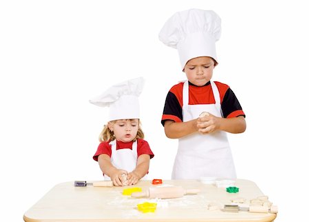 simsearch:400-04114221,k - Two kids preparing the cookies from the dough - isolated Stock Photo - Budget Royalty-Free & Subscription, Code: 400-04043262