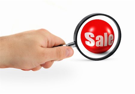 sale concept - hand with magnifying glass Stock Photo - Budget Royalty-Free & Subscription, Code: 400-04043831