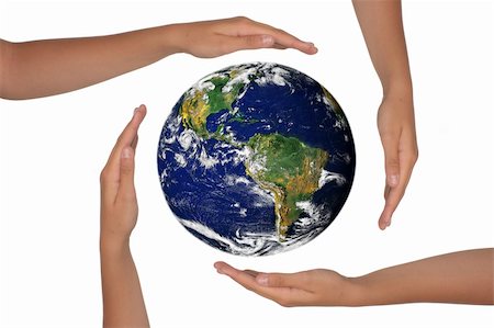 simsearch:400-04776028,k - Young Hands Surrounding the Globe of the Future Photographie de stock - Aubaine LD & Abonnement, Code: 400-04043880