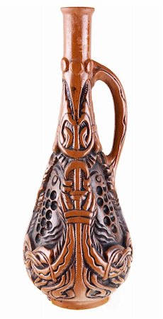 Dark brown clay jug on a white background Foto de stock - Super Valor sin royalties y Suscripción, Código: 400-04043929