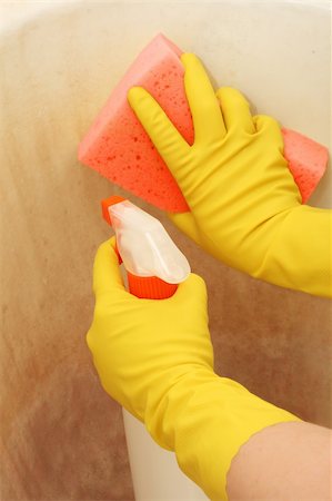rubber hand gloves - Cleaning a very dirty surface with spray and sponge Stock Photo - Budget Royalty-Free & Subscription, Code: 400-04043939
