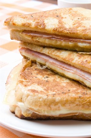 simsearch:400-04054010,k - Toasted cheese and ham sandwiches fried in egg Photographie de stock - Aubaine LD & Abonnement, Code: 400-04054218