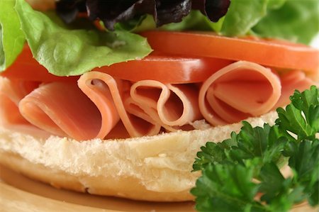 simsearch:400-05255035,k - Freshly prepared ham and salad roll ready to serve. Stock Photo - Budget Royalty-Free & Subscription, Code: 400-04054998