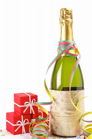 simsearch:400-05082002,k - Champagne bottle with gifts, ribbons and confetti for celebrations Photographie de stock - Aubaine LD & Abonnement, Code: 400-04056289