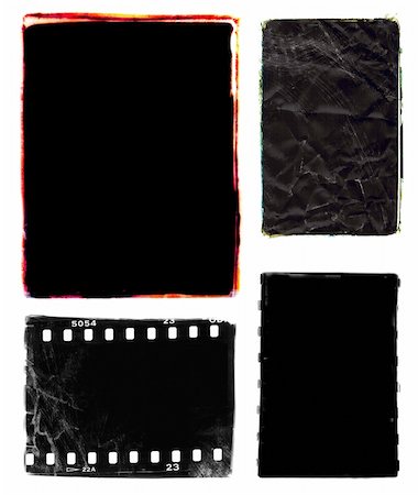 Series of four darkroom 35mm film photo borders with rough edges - one with sprocket holes, two with colour edges.  Frames were created by filing the metal edges of different negative carriers for my enlarger.  Scanned, mutilated and altered in photoshop. Stock Photo - Budget Royalty-Free & Subscription, Code: 400-04057332