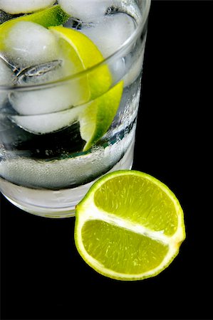Soda water with a slice of lime Stock Photo - Budget Royalty-Free & Subscription, Code: 400-04057359