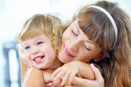 simsearch:400-04535025,k - High key portrait of happy mother with baby Stock Photo - Budget Royalty-Free & Subscription, Code: 400-04058365