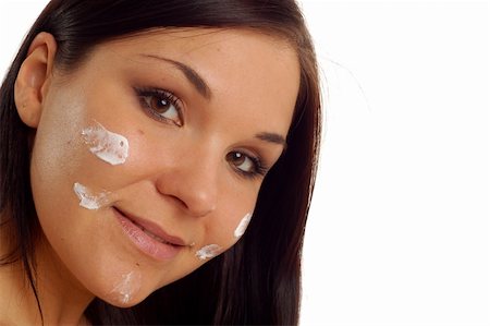 simsearch:400-04127590,k - attractive brunette woman applying cream Stock Photo - Budget Royalty-Free & Subscription, Code: 400-04058716