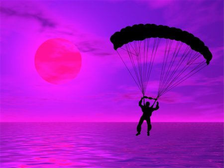 simsearch:400-07666921,k - Parachutist in silhouette against a colorful sunset Fotografie stock - Microstock e Abbonamento, Codice: 400-04058801