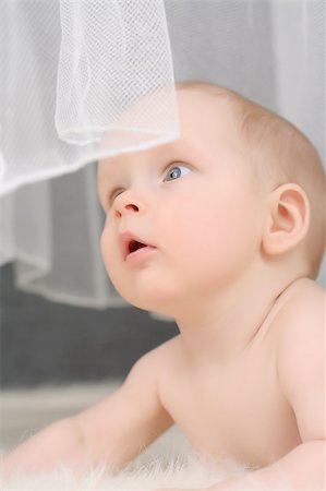 simsearch:400-04093413,k - Cute  portrait of small boy with white curtain Stock Photo - Budget Royalty-Free & Subscription, Code: 400-04058865