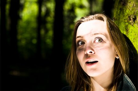 people with forest background - Young Girl Stay Alone In The Forest Stock Photo - Budget Royalty-Free & Subscription, Code: 400-04058968