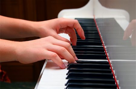 Hands of the musician playing on the piano Stock Photo - Budget Royalty-Free & Subscription, Code: 400-04059129
