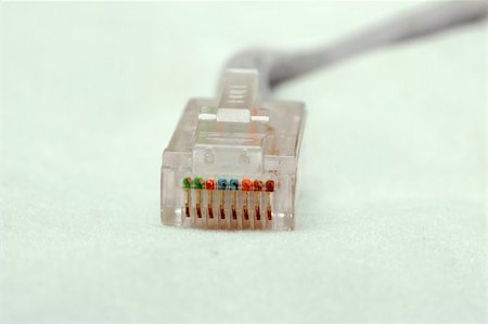 simsearch:625-00898472,k - An RJ-45 network connector at the end of a UTP Ethernet cable Photographie de stock - Aubaine LD & Abonnement, Code: 400-04059310