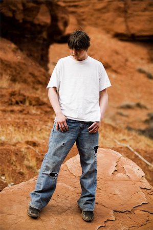 simsearch:400-07680948,k - Teen in nature, in wilderness area standing on large flat rock Stock Photo - Budget Royalty-Free & Subscription, Code: 400-04059433