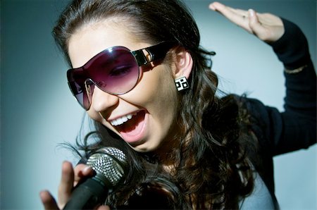 Girl Singing Stock Photo - Budget Royalty-Free & Subscription, Code: 400-04059647