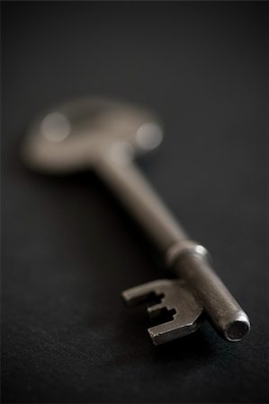 door key on black background Stock Photo - Budget Royalty-Free & Subscription, Code: 400-04059882