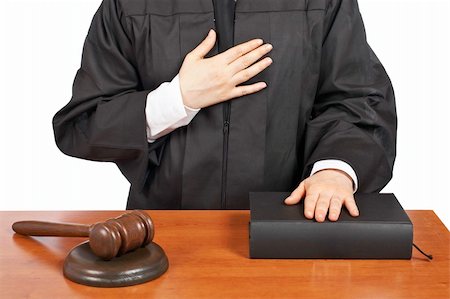 simsearch:700-00015631,k - A female judge taking oath in a courtroom, isolated on white background. Shallow depth of field Stock Photo - Budget Royalty-Free & Subscription, Code: 400-04050116