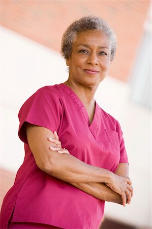 Nurse Standing Outside A Hospital Photographie de stock - Aubaine LD & Abonnement, Code: 400-04050800