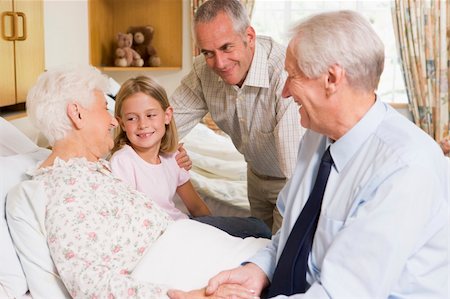 family visiting patient hospital bed - Family Sitting With Senior Woman In Hospital Stock Photo - Budget Royalty-Free & Subscription, Code: 400-04050842