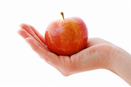 dngood (artist) - An Isolated image of a whole apple held in a hand Fotografie stock - Microstock e Abbonamento, Codice: 400-04050955