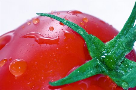 dngood (artist) - Macro shot of a Tomato Fotografie stock - Microstock e Abbonamento, Codice: 400-04050985