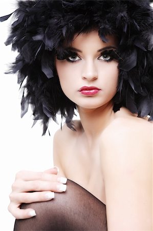 simsearch:400-04042499,k - Beautiful topless young woman in black feathers on white background. Stock Photo - Budget Royalty-Free & Subscription, Code: 400-04051165
