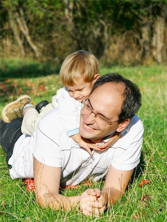 everyday family - father and son outdoor portrait Stock Photo - Budget Royalty-Free & Subscription, Code: 400-04051551