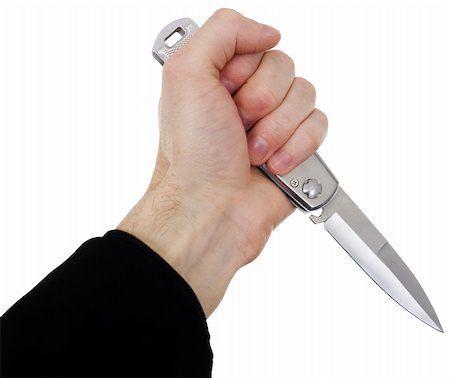 simsearch:400-07779478,k - Man's hand with a knife on a white background Stock Photo - Budget Royalty-Free & Subscription, Code: 400-04051734