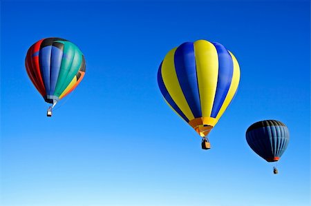 simsearch:400-08032526,k - Colorful hot air balloons against a clear blue sky Foto de stock - Super Valor sin royalties y Suscripción, Código: 400-04051978