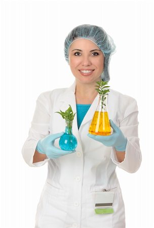 A botanist or scientist holding two plants. Stock Photo - Budget Royalty-Free & Subscription, Code: 400-04052444