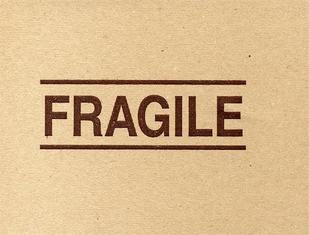 Fragile corrugated cardboard packet Stock Photo - Budget Royalty-Free & Subscription, Code: 400-04052521