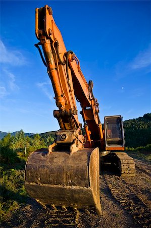 simsearch:400-05111345,k - A big orange bulldozer at construction site Fotografie stock - Microstock e Abbonamento, Codice: 400-04052602