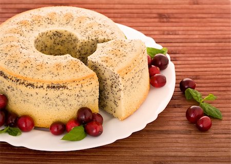 simsearch:400-04709493,k - Poppy seed cake on isolated white Stock Photo - Budget Royalty-Free & Subscription, Code: 400-04053064