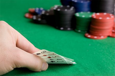 simsearch:400-04672615,k - Bluffing with a poor poker hand Stock Photo - Budget Royalty-Free & Subscription, Code: 400-04053102