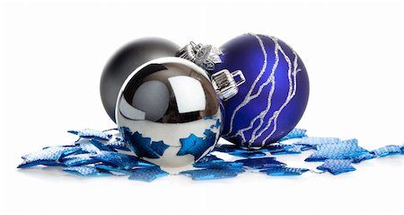 simsearch:400-05177572,k - Christmas balls lying on blue stars, isolated Stock Photo - Budget Royalty-Free & Subscription, Code: 400-04053197