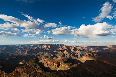 simsearch:400-04378630,k - Grand Canyon during the day with blue sky and clouds Fotografie stock - Microstock e Abbonamento, Codice: 400-04053294