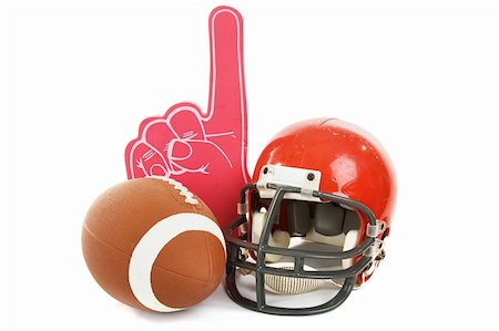 Football, helmet, and foam number one finger.  Isolated on white background. Stock Photo - Budget Royalty-Free & Subscription, Code: 400-04053421