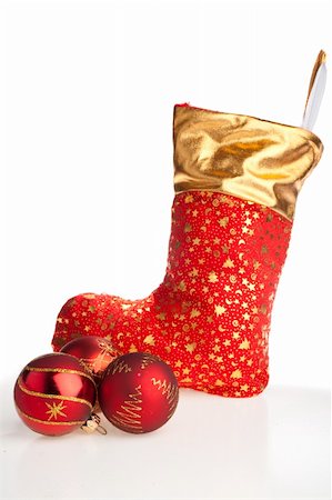 simsearch:400-05177572,k - Christmas boot with presents and red balls beside Stock Photo - Budget Royalty-Free & Subscription, Code: 400-04053777