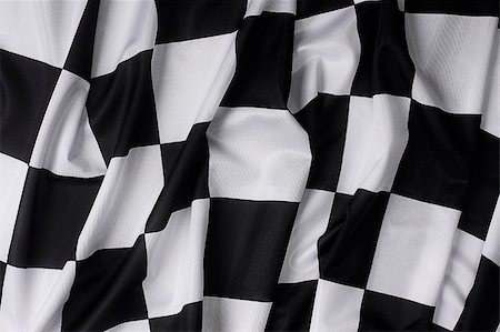 This is a real checkered flag of high quality - texture details in the material Stock Photo - Budget Royalty-Free & Subscription, Code: 400-04064070