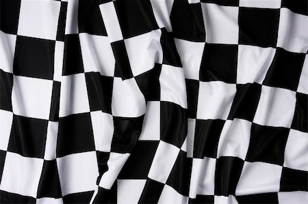 This is a real checkered flag of high quality - texture details in the material Stock Photo - Budget Royalty-Free & Subscription, Code: 400-04064071