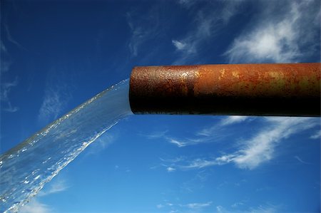 simsearch:400-06201174,k - clean water coming out of an old rusted pipe Stock Photo - Budget Royalty-Free & Subscription, Code: 400-04064082