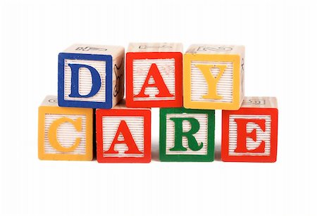 simsearch:400-04660584,k - Alphabet blocks lined up to spell the word daycare isolated on white Foto de stock - Royalty-Free Super Valor e Assinatura, Número: 400-04064105