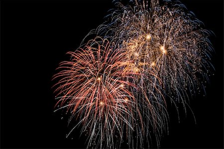 simsearch:400-07093371,k - Amazing display of fireworks with copy space on the left Fotografie stock - Microstock e Abbonamento, Codice: 400-04064138