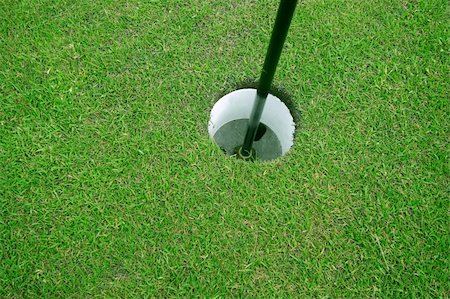 simsearch:400-05370464,k - Close-up of a golf hole Stock Photo - Budget Royalty-Free & Subscription, Code: 400-04064182