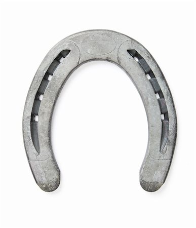 ferradura - Lucky horseshoe isolated on white background - Shot in studio with a 21.1 Megapixel camera Foto de stock - Royalty-Free Super Valor e Assinatura, Número: 400-04064183
