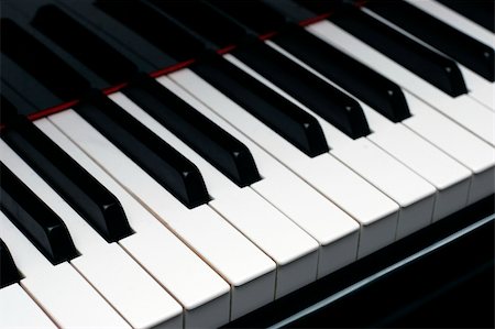 piano à queue - ebony and ivory piano keys on a high quality grand piano Photographie de stock - Aubaine LD & Abonnement, Code: 400-04064259