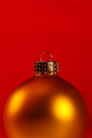 simsearch:400-04776576,k - Macro of yellow ornament isolated against a red background Stock Photo - Budget Royalty-Free & Subscription, Code: 400-04064382