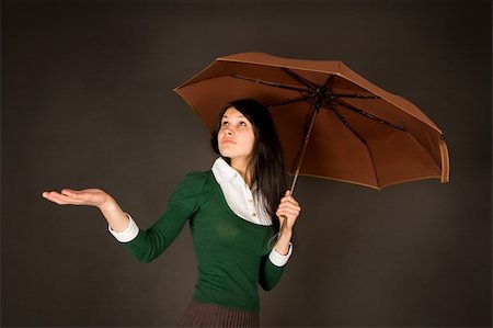 simsearch:400-07680948,k - Girl in teacher or student outfit under umbrella Stock Photo - Budget Royalty-Free & Subscription, Code: 400-04065565