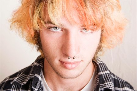 Close-Up of a Punk Boy with Brightly Colored Hair Stock Photo - Budget Royalty-Free & Subscription, Code: 400-04065616